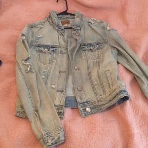 Distressed jean jacket